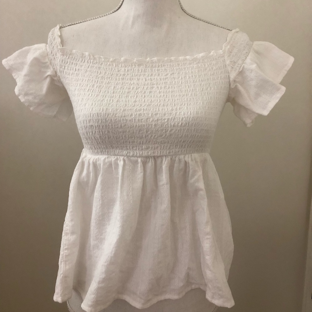White detailed flowy off the shoulder top